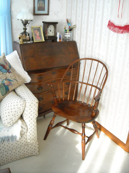 a Windsor chair by the desk